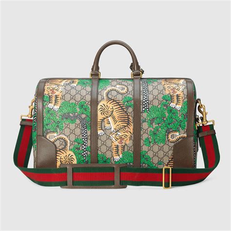 gucci tiger duffle bag|gucci duffle bag outlet.